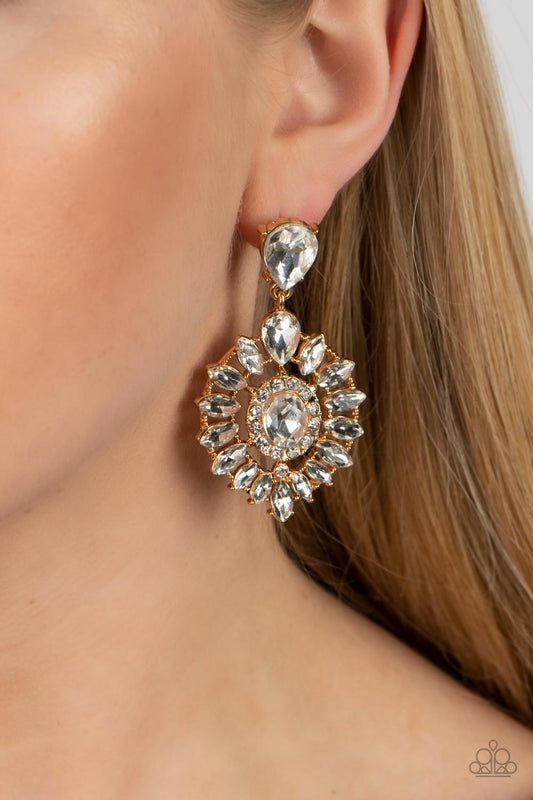 My Good LUXE Charm Gold Earring - Paparazzi Accessories  Bordered in dainty white rhinestones, an oval white gem is pressed into the center of an explosion of white marquise cut rhinestones. The icy gold frame swings from the bottom of a solitaire teardrop rhinestone, adding flirtatious movement to the jaw-dropping display. Earring attaches to a standard post fitting.  Sold as one pair of post earrings.  P5PO-GDXX-225XX