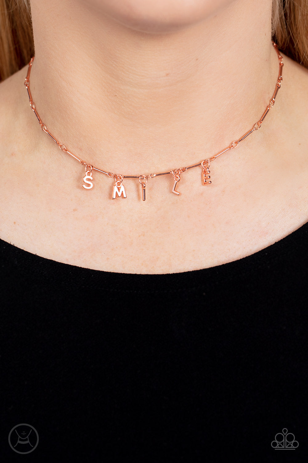 Say My Name Copper Choker Necklace - Paparazzi Accessories  Separated by dainty copper rods, copper letters spell out the word SMILE in a soft, and simple manner. Features an adjustable clasp closure.  Sold as one individual choker necklace. Includes one pair of matching earrings.