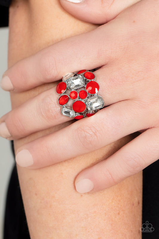 Multichromatic Meditation Red Ring - Paparazzi Accessories  Sparkling white emerald-cut gems, red rhinestones, and red enamel-coated circles in varying sizes gather into an ethereal cluster atop the finger. Features a stretchy band for a flexible fit.  Sold as one individual ring.