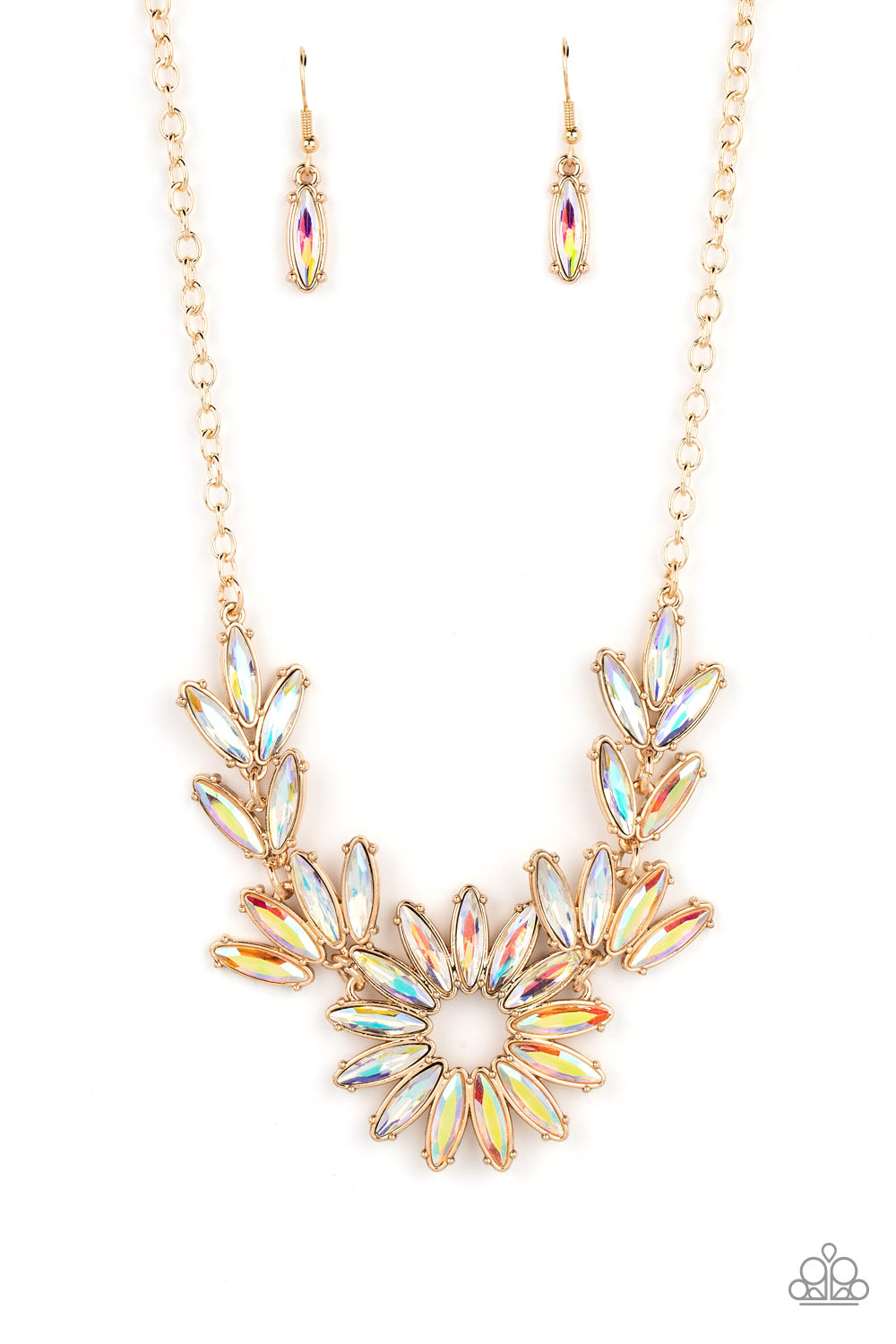 Celestial Cruise Gold Necklace - Paparazzi Accessories  Featuring oblong marquise cuts, a collection of iridescent gems join into leafy gold frames below the collar. Radiating with the same iridescent intensity, even more stellar rhinestones fan out into a circular focal point, resulting in a celestial centerpiece. Features an adjustable clasp closure. Due to its prismatic palette, color may vary.  Sold as one individual necklace. Includes one pair of matching earrings.