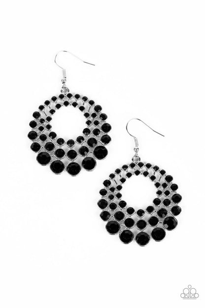 So Self-GLOW-rious Black Earring - Paparazzi Accessories  Gradually increasing in size and intensity, row after row of glassy jet black rhinestones stack into a layered hoop for a blinding effervescence. Earring attaches to a standard fishhook fitting.  Sold as one pair of earrings.