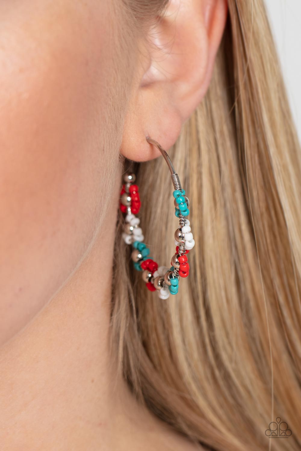Growth Spurt Red Flower Earring - Paparazzi Accessories  Adorned with shiny silver beaded centers, a dainty collection of white, turquoise, and red Branch seed beaded rings create earthy flower accents along a classic silver hoop for a grounding floral display. Earring attaches to a standard post fitting. Hoop measures approximately 1 1/2" in diameter.  Sold as one pair of hoop earrings.