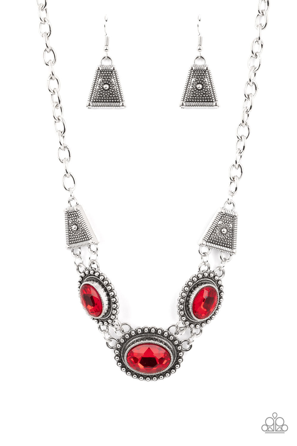 Textured TRAPEZOID Red Necklace - Paparazzi Accessories  Classic oval-shaped rhinestones in a vibrant red hue sit prominently atop silver frames bordered in studded texture. Trapezoidal shaped frames filled with dizzying silver texture lay on each side of the colorful gems, as they fall along the collar in a breathtaking finish. Features an adjustable clasp closure.  Sold as one individual necklace. Includes one pair of matching earrings.
