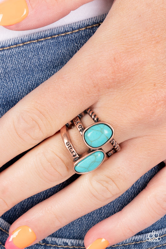 True to You Copper Ring - Paparazzi Accessories  Three bands of copper arc across the finger, creating a layered display. The topmost bar is etched with the word "true" as the center bar completes the inspirational phrase with the words, "to you" etched inside. The last copper bar is twisted in a rope-like texture, as a pair of irregular turquoise stones add a splash of color. Features a stretchy band for a flexible fit.  Sold as one individual ring.