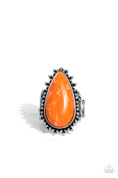Down-to-Earth Essence Orange Ring - Paparazzi Accessories   Chiseled into a tranquil teardrop, a refreshing orange stone is pressed into the center of a studded silver frame for an earthy ensemble. Features a stretchy band for a flexible fit.  Sold as one individual ring.