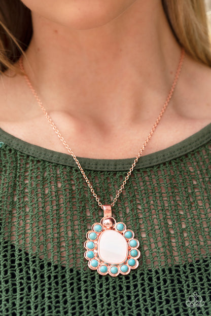 Sahara Sea Copper Necklace - Paparazzi Accessories  Dangling from a shiny copper chain, an asymmetrical white shell with an opal finish is encircled by a turquoise stone-studded frame, creating a seasonal Southwestern pattern. As the stone elements in this piece are natural, some color variation is normal. Features an adjustable clasp closure.  Sold as one individual necklace. Includes one pair of matching earrings.