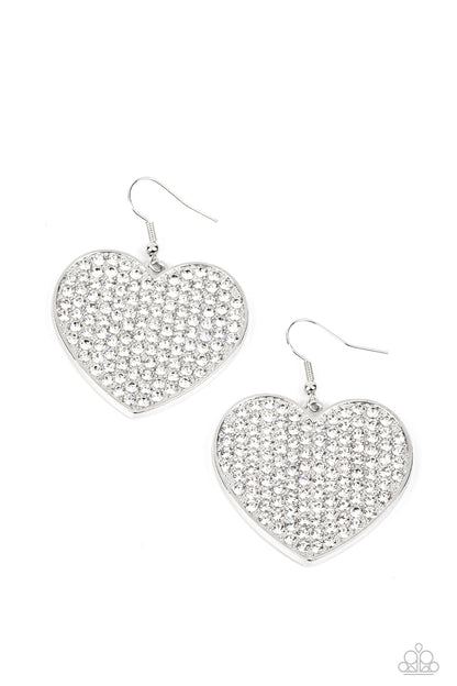 Romantic Reign White Earring - Paparazzi Accessories  A shiny, oversized silver heart is covered in tiny white rhinestones, emitting radiant shimmer as it swings from the ear. Earring attaches to a standard fishhook fitting.  Sold as one pair of earrings.