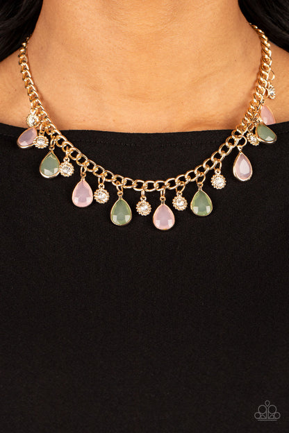 Frosted and Framed Multi Necklace- Paparazzi Accessories ﻿  A thick gold chain is decorated in faceted Loden Frost and baby pink teardrops wrapped in gold frames. The opacity of the beads adds a dreamy feel to the design, while tiny gold accents dotted with white rhinestone centers add a hint of shimmer. Features an adjustable clasp closure.  Sold as one individual necklace. Includes one pair of matching earrings.