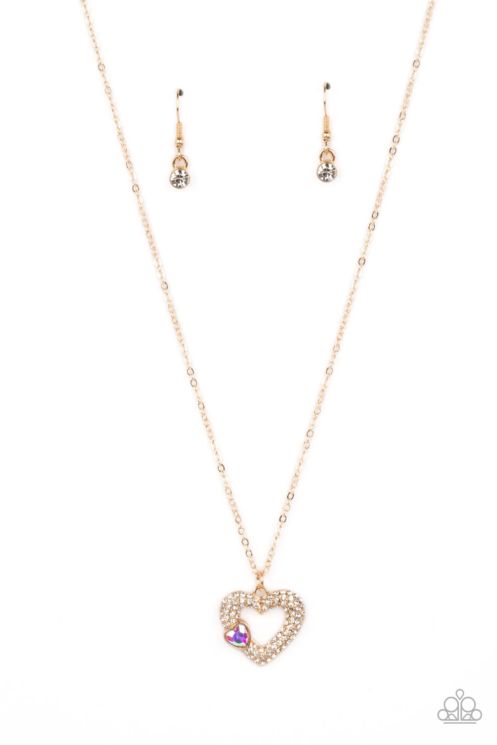 Bedazzled Bliss Multi Necklace - Paparazzi Accessories   A luxurious airy gold heart lush with glassy white rhinestones swings from a classic gold chain. A faceted heart gem brushed in an iridescent shimmer graces one side of the larger bedazzled heart for a romantic finish. Features an adjustable clasp closure. Due to its prismatic palette, color may vary.  Sold as one individual necklace. Includes one pair of matching earrings.