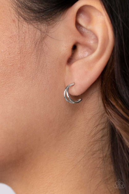 Charming Crescents Silver Mini Hoop Earring - Paparazzi Accessories  Two sleek silver bars curve into a pair of dainty double hoops, creating an effortlessly layered look. Earring attaches to a standard post fitting. Hoop measures approximately 3/8" in diameter.  Sold as one pair of hoop earrings.