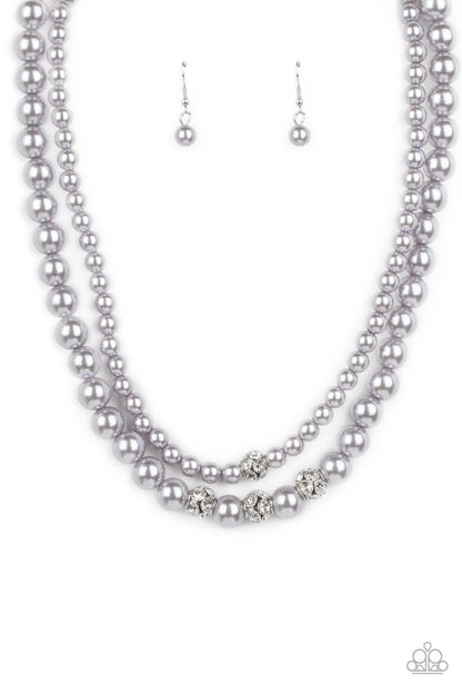 Brilliant Ballerina Silver Pearl Necklace - Paparazzi Accessories   Two strands of classic silver pearls in varying sizes coalesce around the collar in a refined fashion. Silver beads, encrusted in white rhinestones, introduce shimmery detail to each pearly layer, adding a playful spark of shimmer to the timeless design. Features an adjustable clasp closure.  Sold as one individual necklace. Includes one pair of matching earrings.