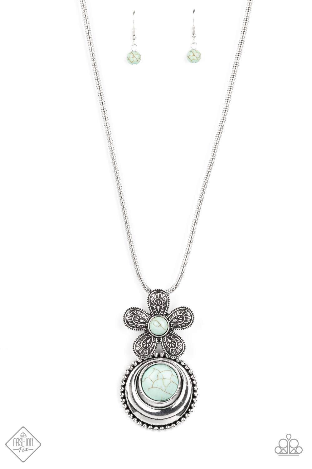 Fluttering from a silver snake chain, an oversized flower with detailed petals blooms around a light blue stone center. A silver pendant with a studded border swings from the single flower for additional movement. A refreshing oversized stone in the same hue is pressed into the center of the pendant for a pop of color amongst the metallic texture. Features an adjustable clasp closure. As the stone elements in this piece are natural, some color variation is normal.