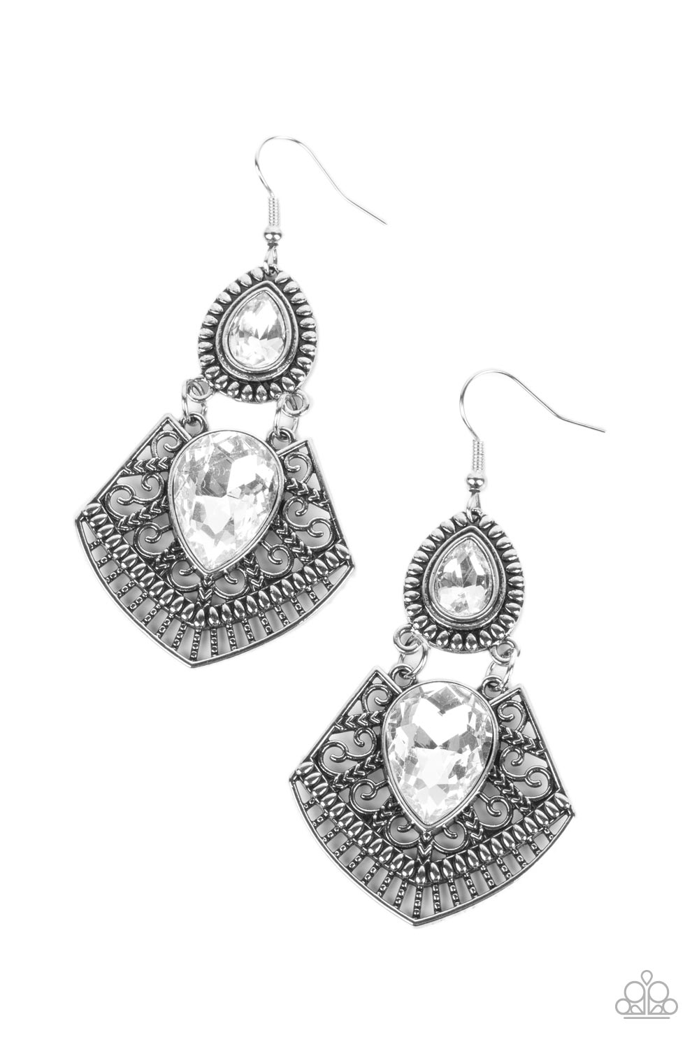 Royal Remix White Earring - Paparazzi Accessories  A white teardrop gem is pressed into a flared silver frame swirled in intricate patterns. The flared frame swings below a smaller white teardrop that is wrapped in a border of silver studs, creating a swinging statement. Earring attaches to a standard fishhook fitting.  Sold as one pair of earrings.  P5ST-WTXX-063XX