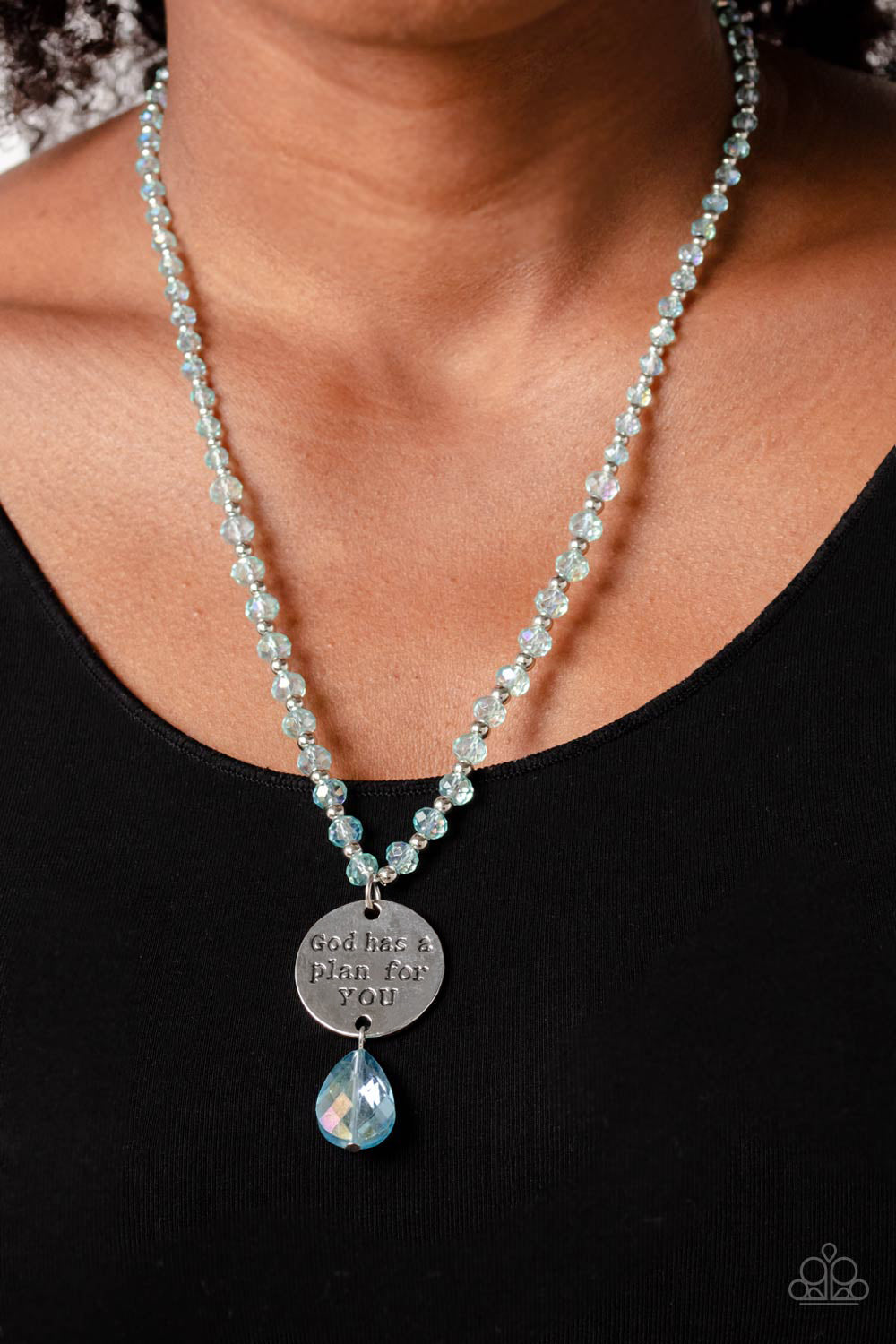 Priceless Plan Blue Necklace - Paparazzi Accessories  Infused along an invisible wire, silver studs and reflective light blue, faceted beads glide down the chest in a shimmery style. Hanging from the bottom of the beads and studs, a hammered silver disc is stamped with the phrase "God has a plan for YOU" with a reflective, blue faceted teardrop bead adding additional swing to the divine design. Features an adjustable clasp closure.  Sold as one individual necklace. Includes one pair of matching earrings.