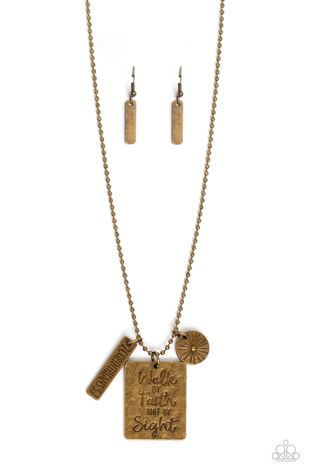Sunshine Sight Brass Inspirational Necklace - Paparazzi Accessories  Hanging from a brass ball chain, a gritty collection of a rectangular plate dangles next to a disc featuring a sun, and a bar stamped with the Bible reference "2 Corinthians 5:7". The three dangling brass shapes add eye-catching movement to the inspired design. Prominently stamped on the rectangular pendant, the words "Walk by Faith not by Sight" stand out for a faith-filled finish. Includes one pair of matching earrings.
