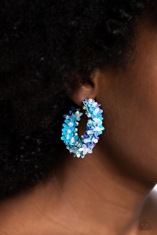 Fairy Fantasia Blue Hoop Earring - Paparazzi Accessories  A floral explosion, encompassing the entirety of a thick silver hoop, features reflective light blue flowers dotted with dainty pearl centers for a dreamy, whimsicality below the ear. Earring attaches to a standard post fitting. Hoop measures approximately 1 1/2" in diameter.  Sold as one pair of hoop earrings.  P5HO-BLXX-046XX