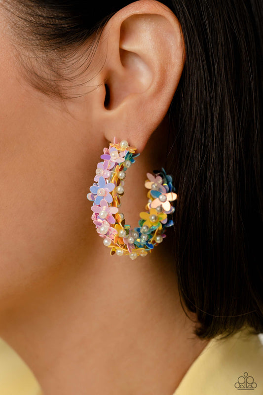 Fairy Fantasia Multi Hoop Earring - Paparazzi Accessories  A floral explosion, encompassing the entirety of a thick silver hoop, features reflective light blue, pink, and yellow flowers dotted with dainty pearl centers for a dreamy, whimsicality below the ear. Earring attaches to a standard post fitting. Hoop measures approximately 1 1/2" in diameter.  Sold as one pair of hoop earrings.  P5HO-MTXX-070XX