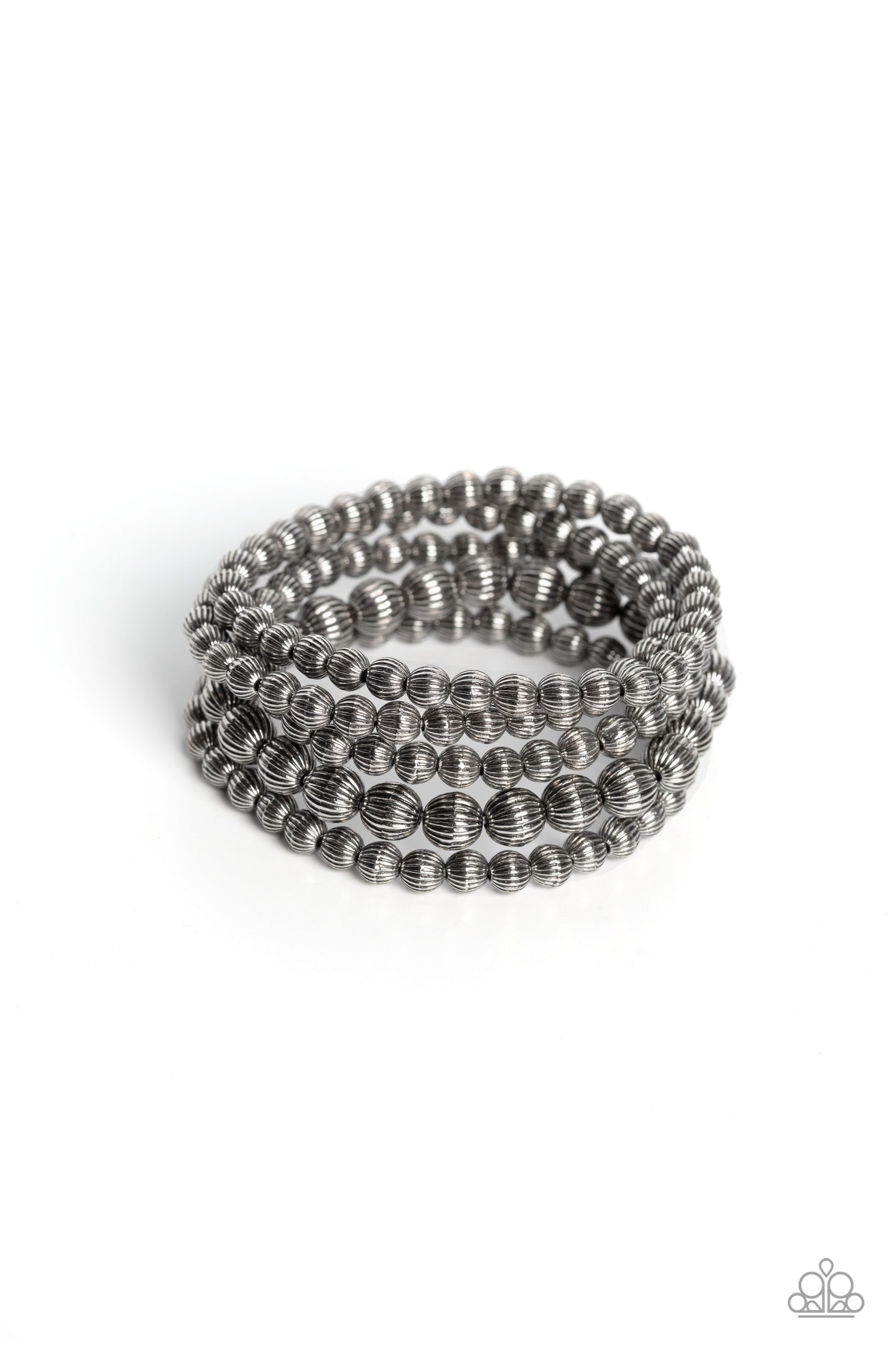 Sonoran Stripes Silver Bracelet - Paparazzi Accessories  Gritty strands of silver beads etched in linear patterns wrap around the wrist on stretchy bands. One strand of the linear silver beads features bigger beads than the rest of the collection for an earthy contrast to the design.  Sold as one set of five bracelets.