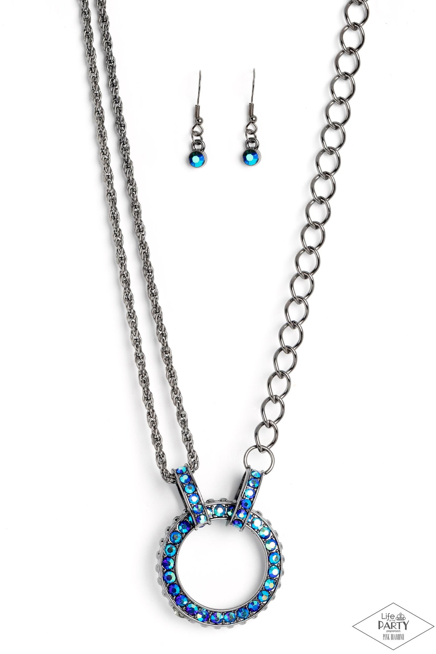 Razzle Dazzle Blue Necklace - Paparazzi Accessories  A collision of mismatched gunmetal chains gives way to a studded gunmetal pendant that has been encrusted in glittery blue UV rhinestones. The result is a gritty, industrial design with endless attitude. Features an adjustable clasp closure.  Sold as one individual necklace. Includes one pair of matching earrings.  P2ED-BLXX-046XX