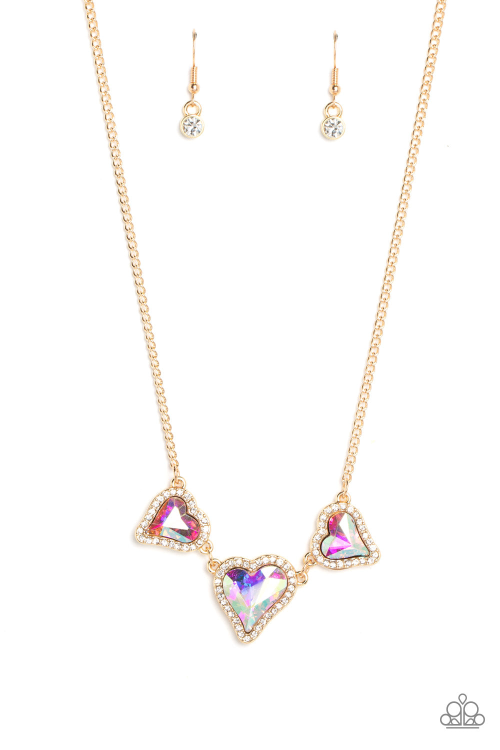 State of the HEART Gold Necklace - Paparazzi Accessories  Nestled in white rhinestone frames, a trio of glittery iridescent heart-shaped gems delicately links and dangles down the neckline for a dash of swoon-worthy shimmer on a gold chain. Features an adjustable clasp closure. Due to its prismatic palette, color may vary.  Sold as one individual necklace. Includes one pair of matching earrings.  P2RE-GDXX-456XX