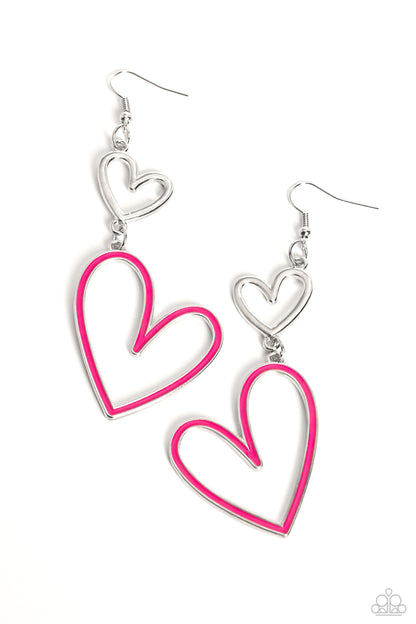 Pristine Pizzazz Pink Heart Earring - Paparazzi Accessories  Dangling from an abstract silver heart frame, another heart frame, this time an oversized one, features a border of Pink Peacock paint, creating an attention-grabbing romantic statement below the ear. Earring attaches to a standard fishhook fitting.  Sold as one pair of earrings.  P5WH-PKXX-275XX