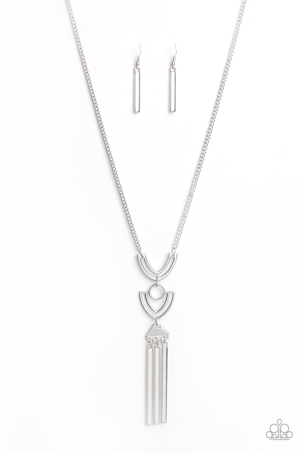 Confidently Cleopatra Silver Necklace - Paparazzi Accessories Item #JJG-N279 Two airy geometric silver frames link at the bottom of a lengthened silver chain, creating a stacked pendant. Rectangular bars swing from the bottom of the pendant, adding a bold movement to the tribal inspired piece. Features an adjustable clasp closure. All Paparazzi Accessories are lead free and nickel free!  Sold as one individual necklace. Includes one pair of matching earrings.