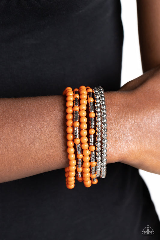 Mythical Magic Orange Bracelet - Paparazzi Accessories  A trendy collection of orange, silver and silver cylindrical textured beads wrap around the wrist on elastic stretchy bands for a colorful, seasonal stack.  Sold as one set of six bracelets.  P9SE-OGXX-200XX