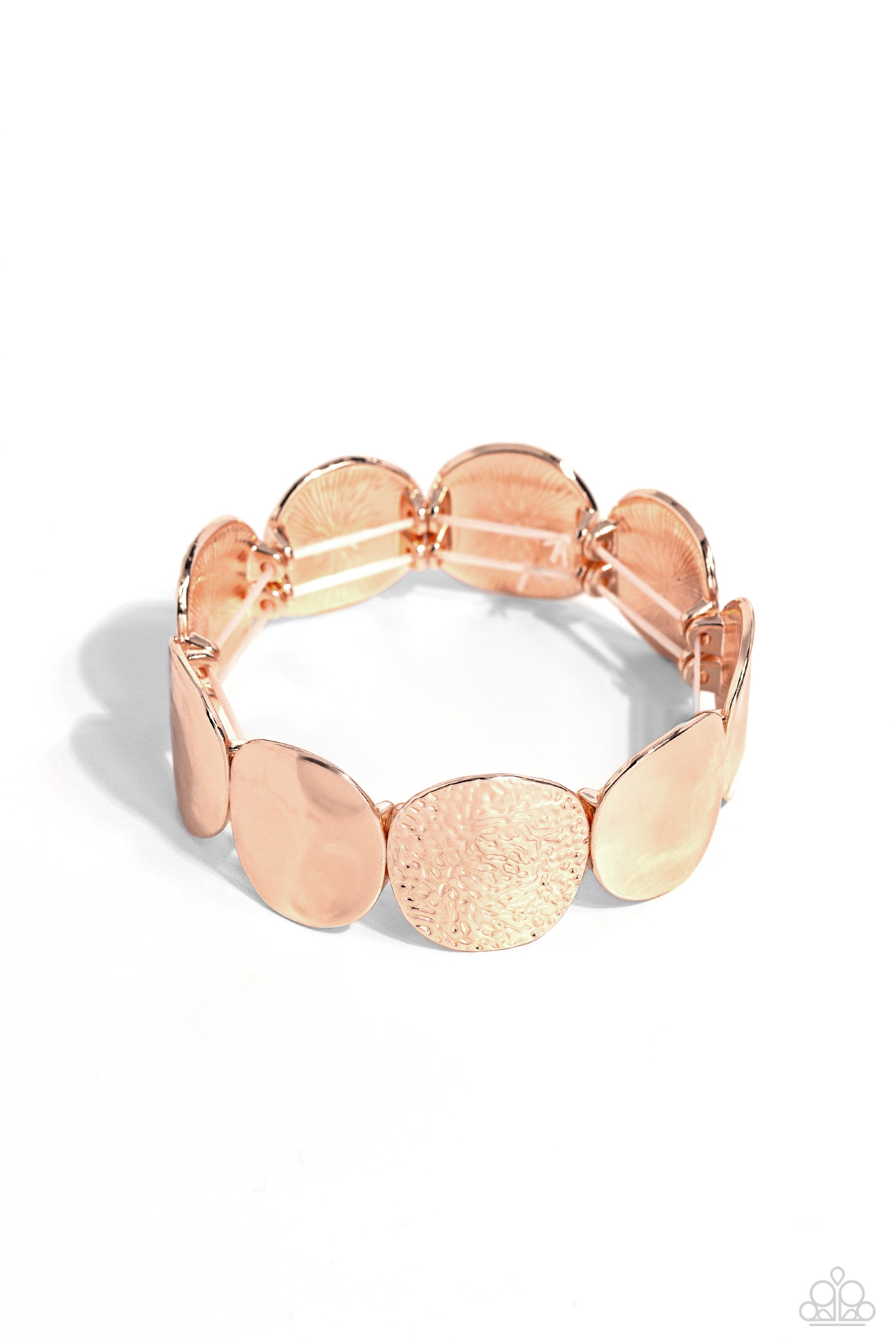 Rippling Record Rose Gold Stretch Bracelet - Paparazzi Accessories  A hammered collection of asymmetrical rose gold discs are threaded along stretchy bands around the wrist for a refined flair. The rose gold discs feature both a rippling hammered effect and a more subtle hammered effect, creating a fashionable contrast amidst the same color.  Sold as one individual bracelet.  Sku:  P9BA-GDRS-121XX