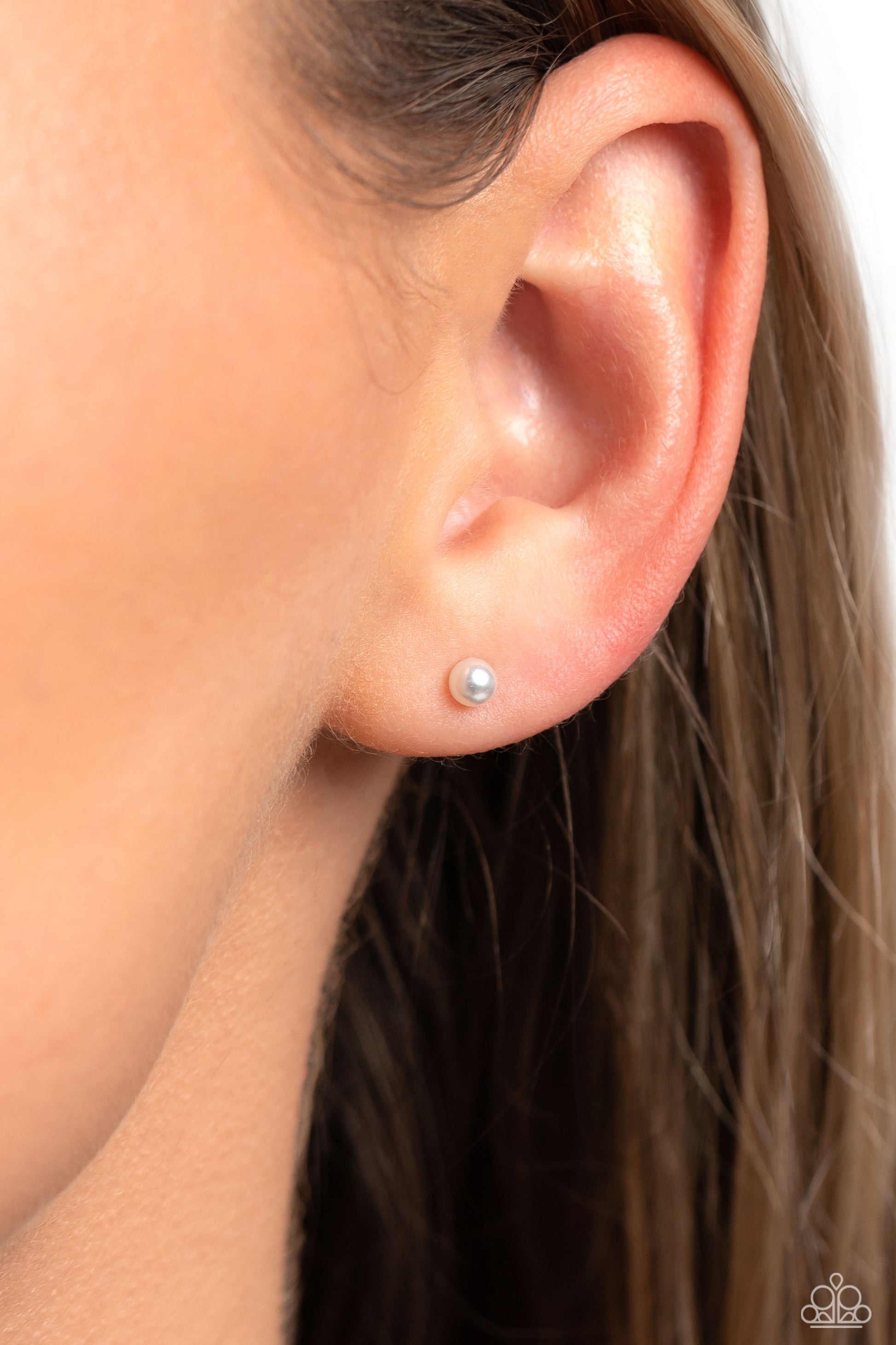 Dainty Details White Pearl Stud Earring - Paparazzi Accessories  A dainty white pearl rests against the ear for a timeless basic staple piece perfect for a vintage look. Earring attaches to a standard post fitting.  Sold as one pair of post earrings.  P5PO-WTXX-369XX