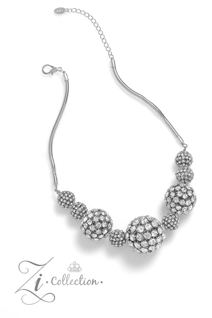 Undaunted White Rhinestone 2023 Zi Collection Necklace - Paparazzi Accessories  Glittery, white rhinestones cluster together, creating dramatically oversized, airy, spheres that sparkle vivaciously. Smaller rhinestone-encrusted spheres dance between the exaggerated accents, resulting in a dynamic display of texture and sheen. Features an adjustable clasp closure.  Sold as one individual necklace. Includes one pair of matching earrings.
