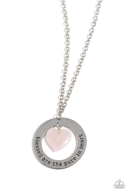 Beatitude Boho Pink Inspirational Necklace - Paparazzi Accessories  A pink stone heart swings from the bottom of an oversized silver hoop fitting, creating a simplistically earthy pendant at the bottom of a classic silver chain. The phrase "blessed are the pure in heart" is stamped along the curve of the silver hoop frame, finishing the design off with an inspirational finish. Features an adjustable clasp closure. As the stone elements in this piece are natural, some color variation is normal.