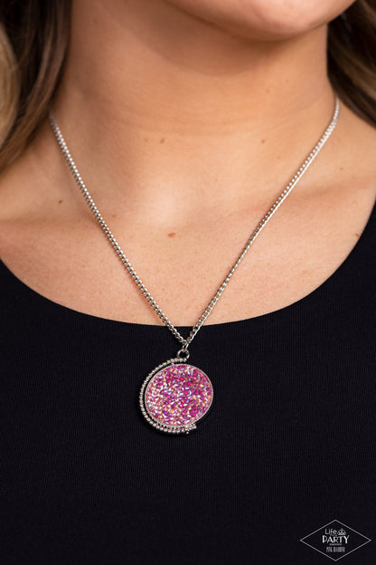 My Moon and Stars Multi Necklace - Paparazzi Accessories  A smoldering collision of blue iridescent and pink iridescent rhinestones are encrusted across the front and back of a textured silver disc below the collar. Threaded along a dainty rod, the glittery pendant effortlessly spins on its axis inside a silver studded half-circle frame. Features an adjustable clasp closure. Due to its prismatic palette, color may vary.