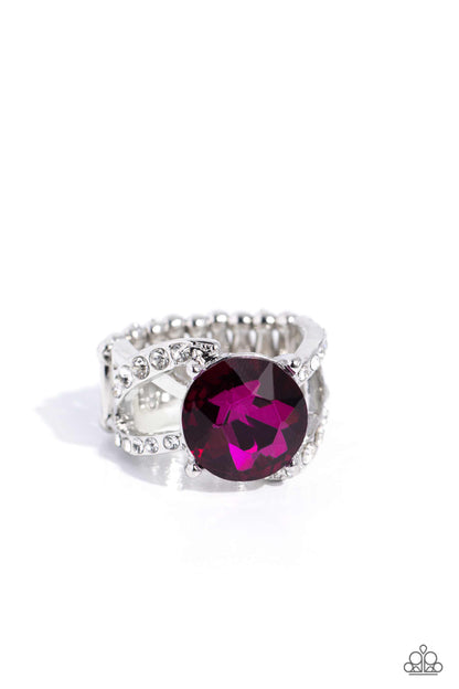 Scintillating Swirl Pink Rhinestone Ring - Paparazzi Accessories  Glistening silver bars and white rhinestone-encrusted bands swirl across the finger, coalescing into an airy band. Featuring a regal faceted surface, a glittery fuchsia gem is pressed into the center of the frame in silver-pronged fittings for a refined finish. Features a stretchy band for a flexible fit.  Sold as one individual ring.  Sku:  P4RE-PKXX-283XX