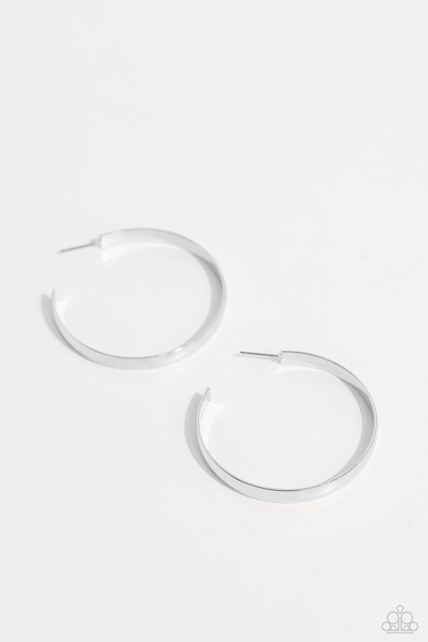 Sleek Symmetry Silver Hoop Earring - Paparazzi Accessories  Radiating with high-sheen detail, a sleek, thick silver hoop curls around the ear for a classic, staple look. Earring attaches to a standard post fitting. Hoop measures approximately 1 3/4" in diameter.  Sold as one pair of hoop earrings.  Sku:  P5HO-SVXX-368XX