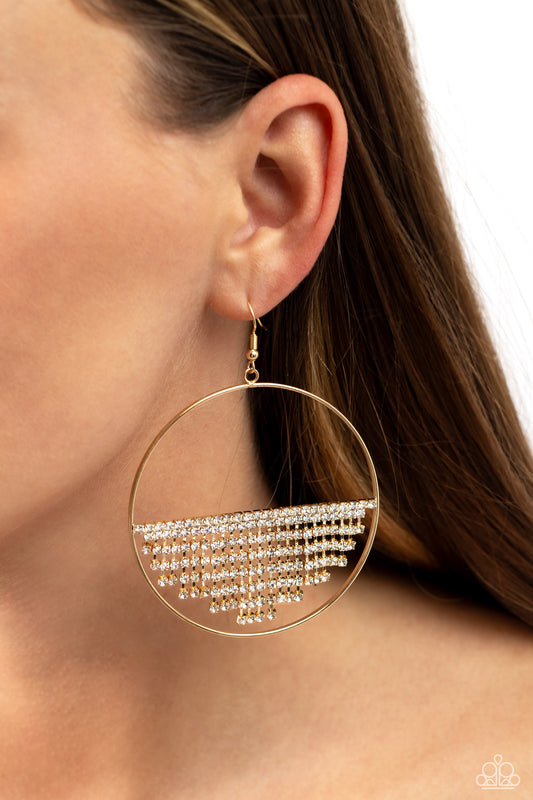Fierce Fringe Gold Earring - Paparazzi Accessories  A curtain of white rhinestones is stretched between the edges of a skinny, oversized gold hoop, creating a shimmering display. The rhinestones taper towards the center as they sway and cascade, adding sparkly movement for a fierce industrial finish. Earring attaches to a standard fishhook fitting.  Sold as one pair of earrings.  P5ED-GDXX-087XX