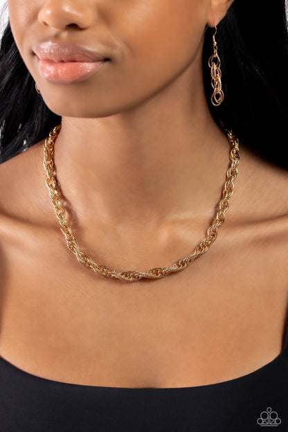 Braided Ballad Gold Rope Necklace - Paparazzi Accessories  Rings of gold, each embroidered in tactile texture weave into an interconnected braided centerpiece for a monochromatic chic look. Features an adjustable clasp closure.  Sold as one individual necklace. Includes one pair of matching earrings.  Sku:  P2ED-GDXX-159XX