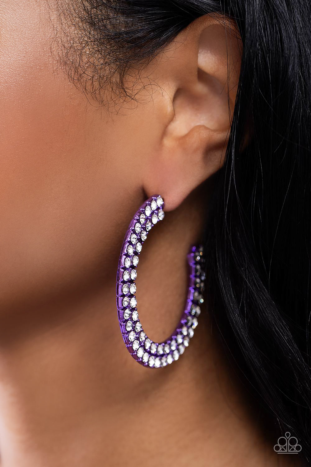 Flawless Fashion Purple Hoop Earring - Paparazzi Accessories  The outer curve of an oversized thick metallic purple hoop is encrusted in a staggered double row of dazzling white rhinestones for a flawless look. Earring attaches to a standard post fitting. Hoop measures approximately 2 1/4" in diameter.  Sold as one pair of hoop earrings.  Sku:  P5HO-PRXX-023XX