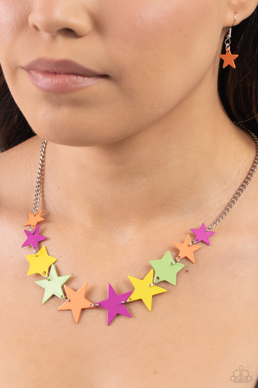 Starstruck Season Multi Star Necklace - Paparazzi Accessories  Featuring various sizes, a collection of Kohlrabi, High Visibility, orange, and Rose Violet stars cascade around the neckline, on a classic silver chain creating an intense, starstruck statement. Features an adjustable clasp closure.  Featured inside The Preview at Made for More! Sold as one individual necklace. Includes one pair of matching earrings.  P2ST-MTXX-132XX