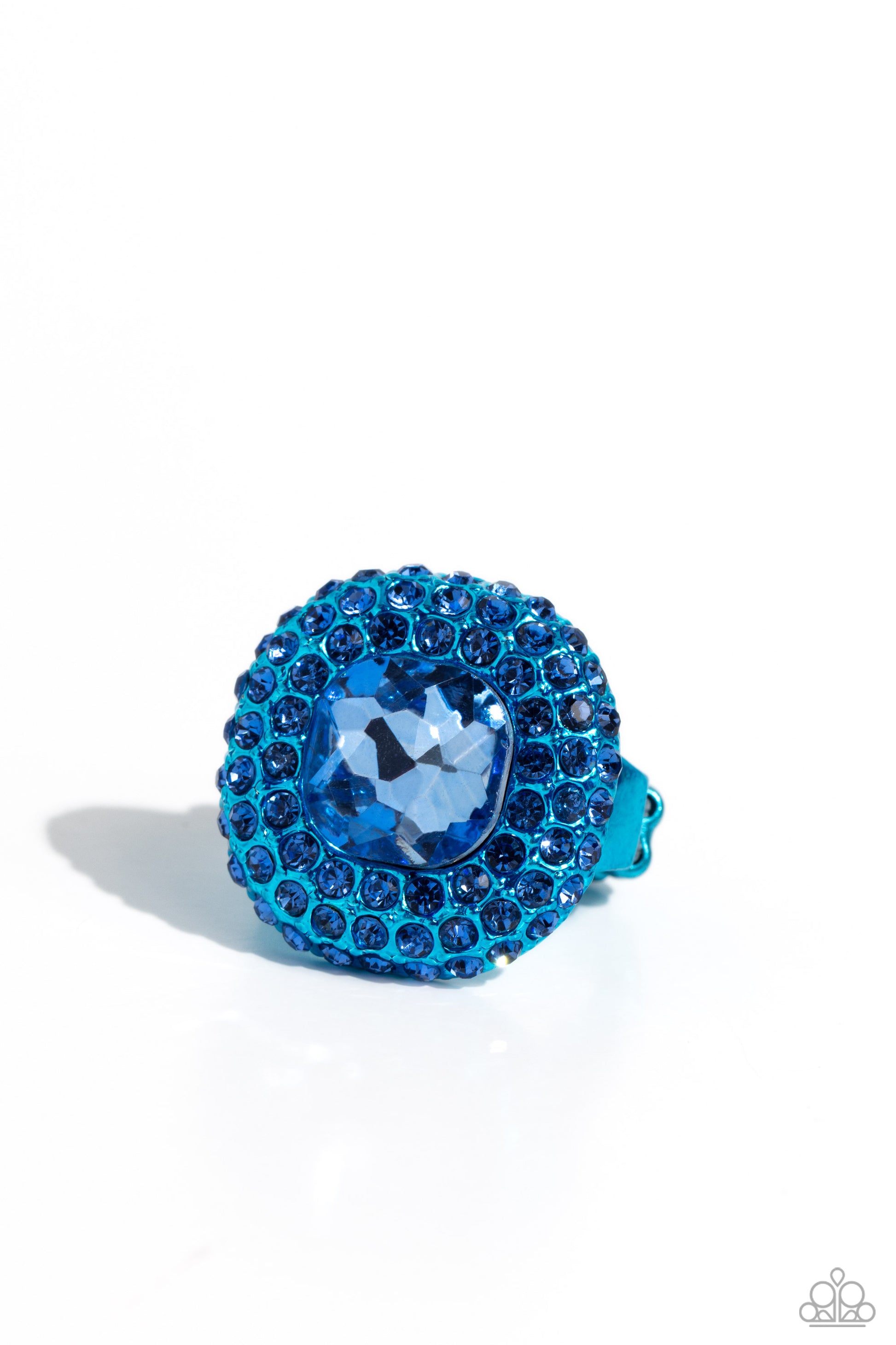 Glistening Grit Blue Ring - Paparazzi Accessories  Featuring a regal square cut, an oversized Persian Jewel gem nestles inside a rounded square blue metallic frame encrusted in glassy blue rhinestones for a dramatically glamorous look. Features a dainty stretchy band for a flexible fit.  Sold as one individual ring.  P4ST-BLXX-025XX