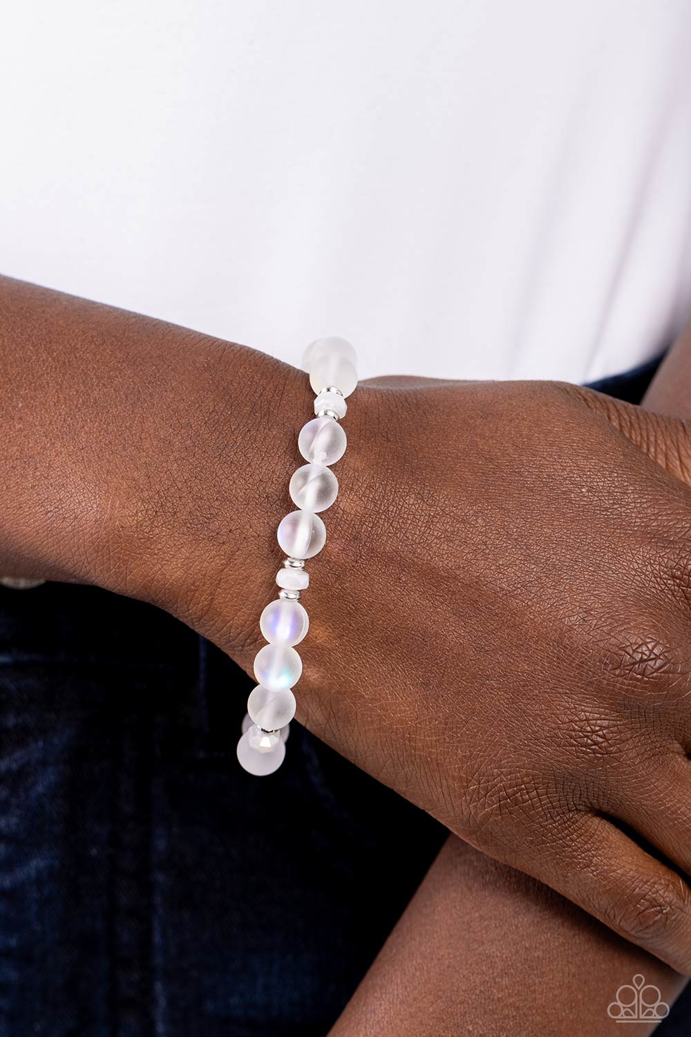 Mermaid Mirage White Bracelet - Paparazzi Accessories  Infused with silver accents and faceted white beads, a dreamy collection of frosted glassy white beads is threaded along a stretchy band around the wrist for an enchanting glow.  Sold as one individual bracelet.  P9SE-URWT-106XX