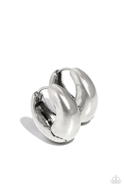 Boss BEVEL Silver Hinge Hoop Earring - Paparazzi Accessories  Featuring a beveled surface, a thick silver hoop snugly curls around the ear for a dainty, sleek basic look. Earring attaches to a standard hinge closure fitting. Hoop measures approximately 3/4" in diameter.  Sold as one pair of hinge hoop earrings.  P5HO-SVXX-373XX