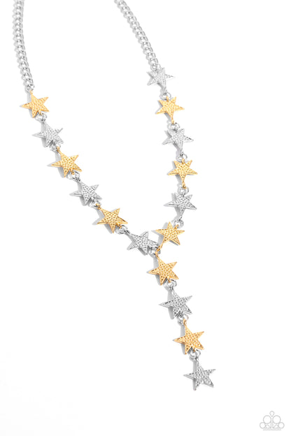 Reach for the Stars Multi Necklace - Paparazzi Accessories  Featuring a studded motif, a collection of gold and silver stars alternate and interlock below the collar on a classic silver chain, glistening into an edgy extended pendant for a stellar-making finish. Features an adjustable clasp closure.  Sold as one individual necklace. Includes one pair of matching earrings.  P2ED-MTXX-066XX