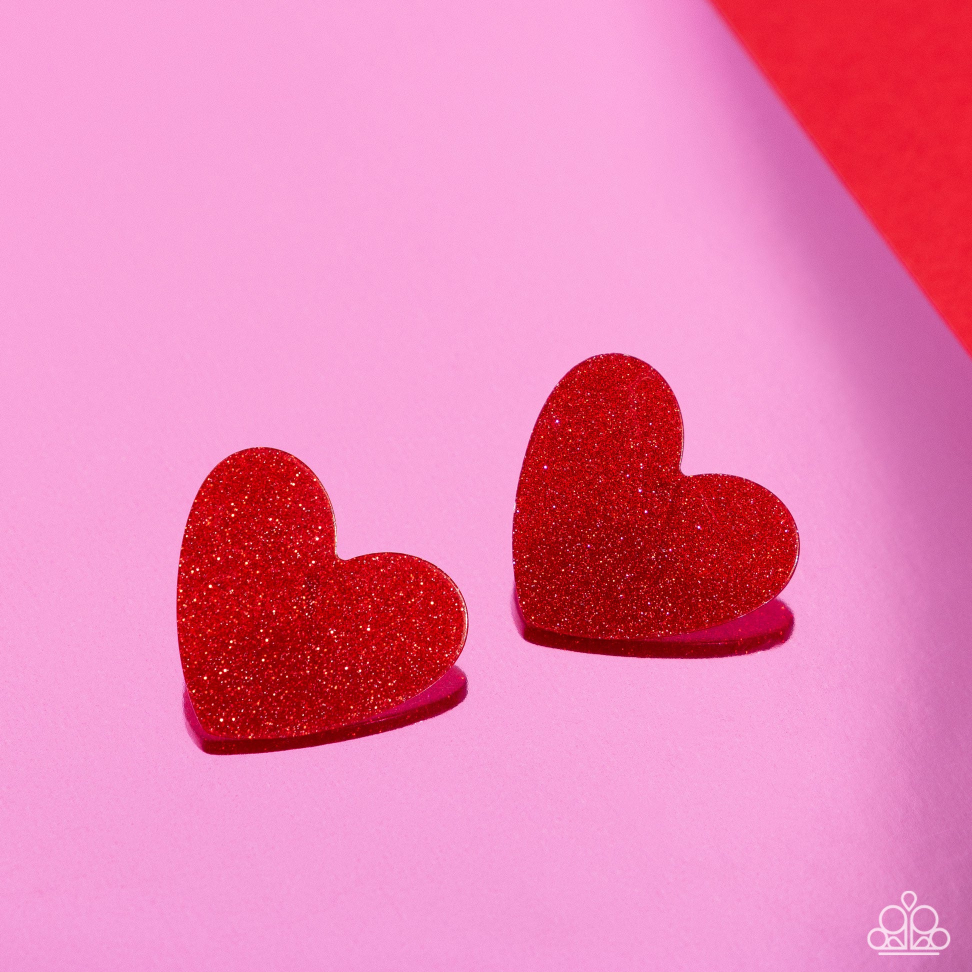 Sparkly Sweethearts Red Heart Post Earring - Paparazzi Accessories  Dusted in sparkles, a red acrylic flat heart frame shimmers and shines from the ear for a flirtatious finish. Earring attaches to a standard post fitting.  Sold as one pair of post earrings.  SKU: P5PO-RDXX-046XX