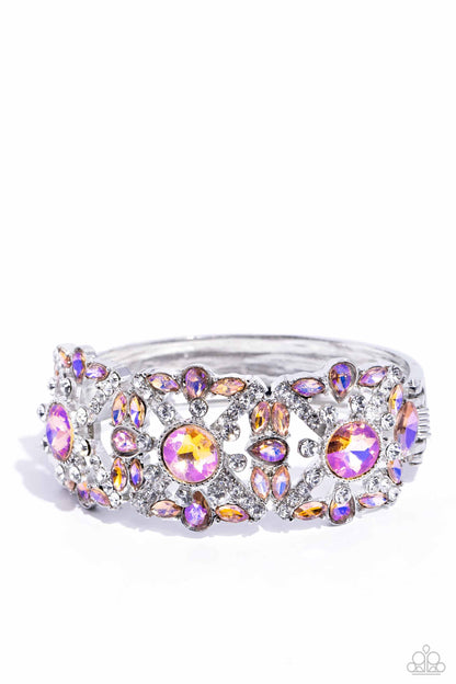 Shimmering Solo Orange Hinge Bracelet - Paparazzi Accessories  Various orange and white rhinestones in round, teardrop, and marquise cuts sparkle atop airy, silver frames, connected to a silver bangle-like bracelet around the wrist for a jaw-dropping dazzle. Features a hinged closure.  Sold as one individual bracelet.  SKU: P9RE-OGXX-067XX