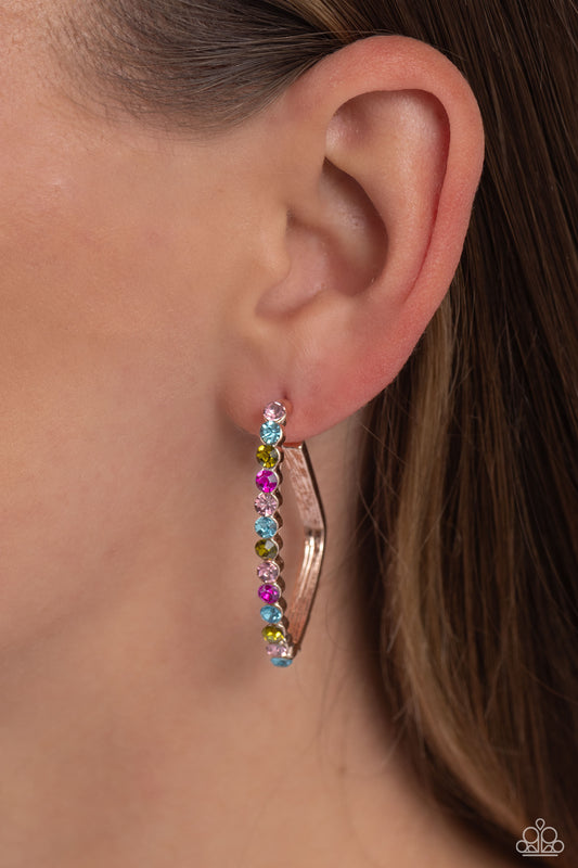 Triangular Tapestry Rose Gold Hoop Earring - Paparazzi Accessories  The front of a bold rose gold hoop is encrusted in multicolored rhinestones, creating a sparkly spectrum of color. The multicolored scalloped frame leisurely bends into an airy triangular frame for a geometric motif. Earring attaches to a standard post fitting. Hoop measures approximately 1/2" in diameter.  Sold as one pair of hoop earrings.  Sku:  P5HO-GDRS-319XX