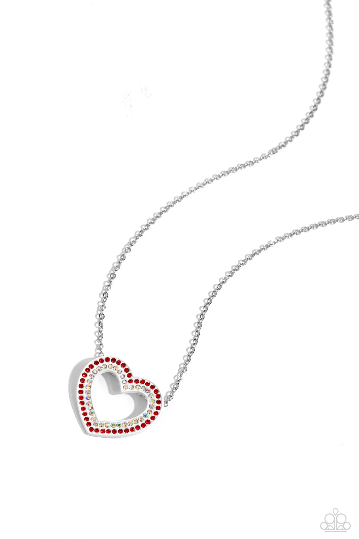 Hyper Heartland Multi Heart Necklace - Paparazzi Accessories  Two rows of glassy red and iridescent rhinestones are encrusted along the front of a white heart frame that glides along a dainty silver chain, creating a flirty centerpiece. Features an adjustable clasp closure. Due to its prismatic palette, color may vary.  Sold as one individual necklace. Includes one pair of matching earrings.  SKU: P2RE-MTXX-232XX