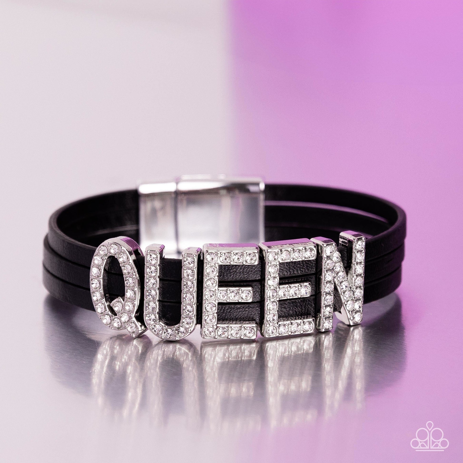 Queen of My Life Black Wrap Bracelet - Paparazzi Accessories  Featuring glistening white rhinestones, silver letter frames forming the word "QUEEN" are threaded along layers of black leather strands around the wrist for a dazzling statement. Features a magnetic closure.  Sold as one individual bracelet.  P9SE-BKXX-343XX