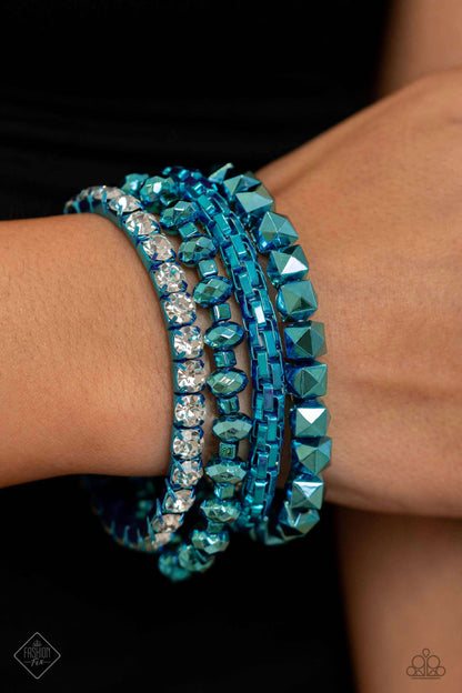 Punk Pattern Blue Stretch Bracelet - Paparazzi Accessories  Featuring a metallic blue hue, a collection of faceted beaded strands, a rounded box chain strand, and white rhinestones pressed in metallic blue fittings coalesce around the wrist for a punk-inspired stack.  Sold as one set of four bracelets.  Sku:  P9ED-BLXX-040SF