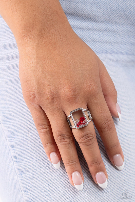 Encased Envy Red Ring - Paparazzi Accessories  A collection of white, red, and light red gems and rhinestones are encased inside a glassy, emerald-cut casing, creating an edgy, standout centerpiece atop airy silver bands. Features a stretchy band for a flexible fit.  Sold as one individual ring.  Sku:  P4ST-RDXX-013XX