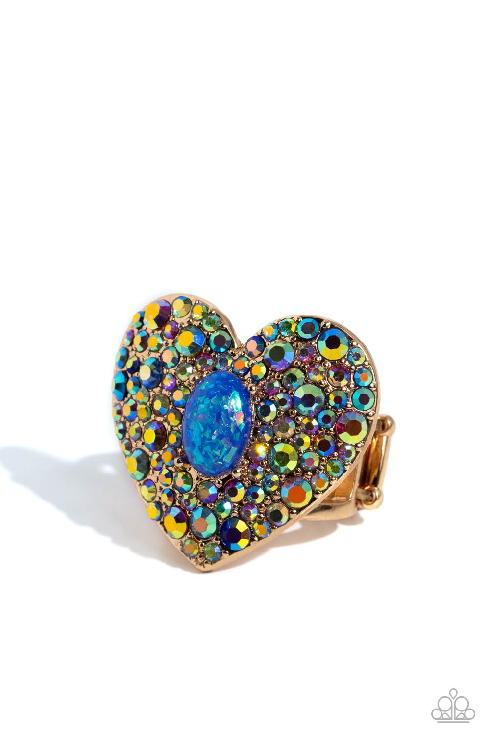 Bejeweled Beau Blue Ring - Paparazzi Accessories  Encrusted in brilliant multicolored and iridescent rhinestones, a glittery gold heart frame adorns the center of an airy gold band for a flirtatious finish. Featuring iridescent flecks, an opalescent blue oval bead is pressed in the center of the heart frame for additional eye-catching shimmer. Features a stretchy band for a flexible fit. Due to its prismatic palette, color may vary.  Sold as one individual ring.  P4ST-BLXX-029XX